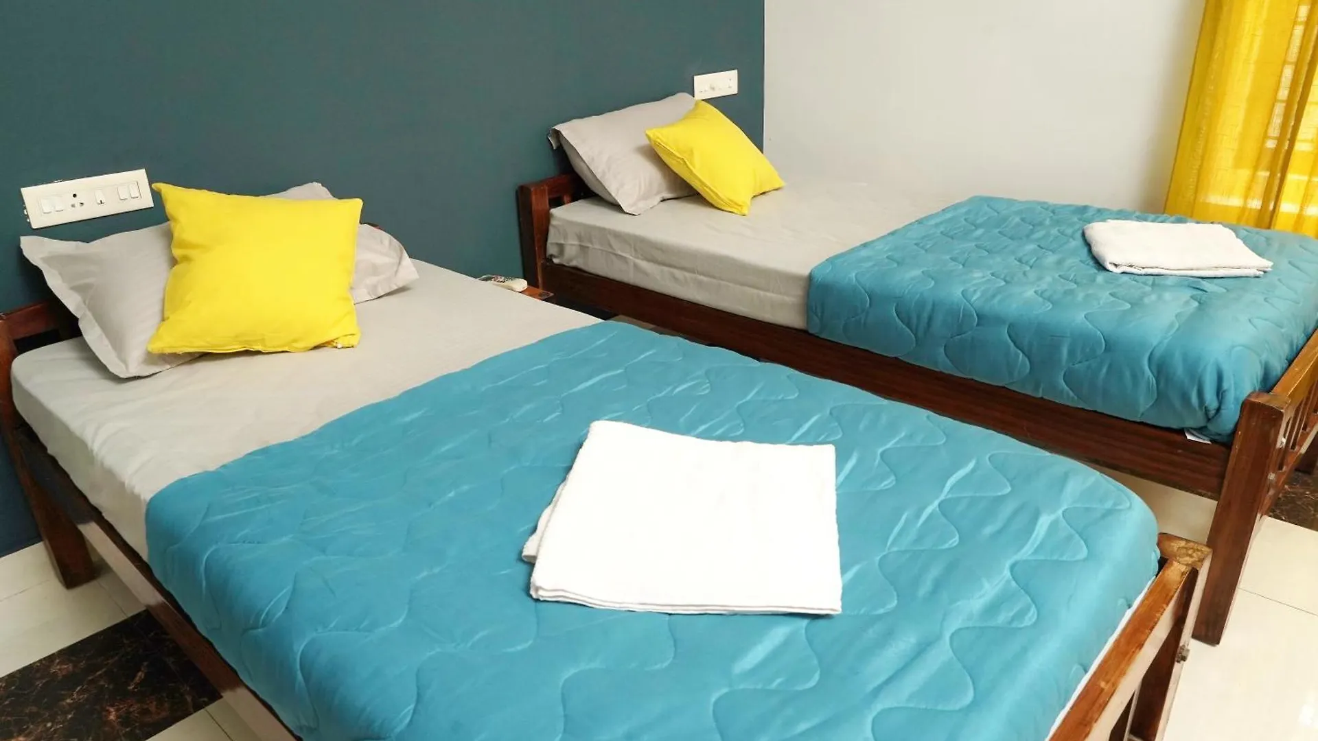 Проживание в семье Orange Valley Town Residency Тривандрум